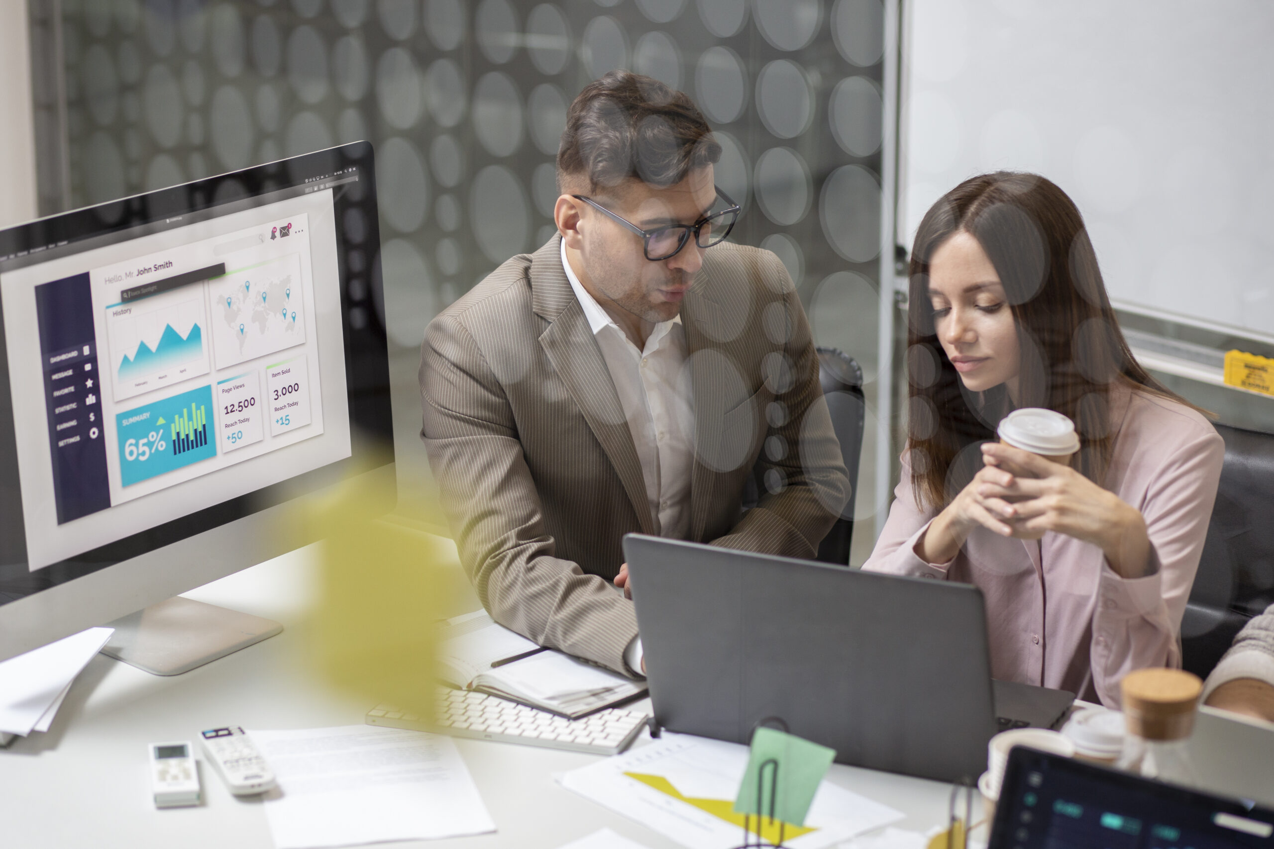 Professional Web Design User experience designer working on a website interface with wireframes, color palettes, and layout elements on a screen